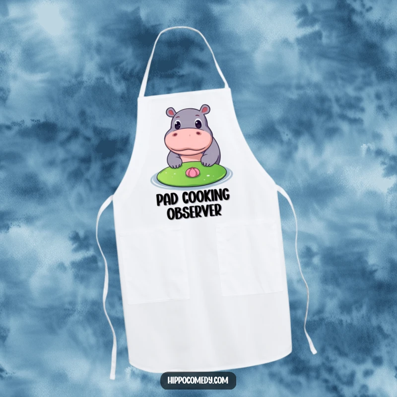 Funny apron showing a hippopotamus with wide eyes observing a floating lily pad, adding a peaceful and whimsical touch to cooking.