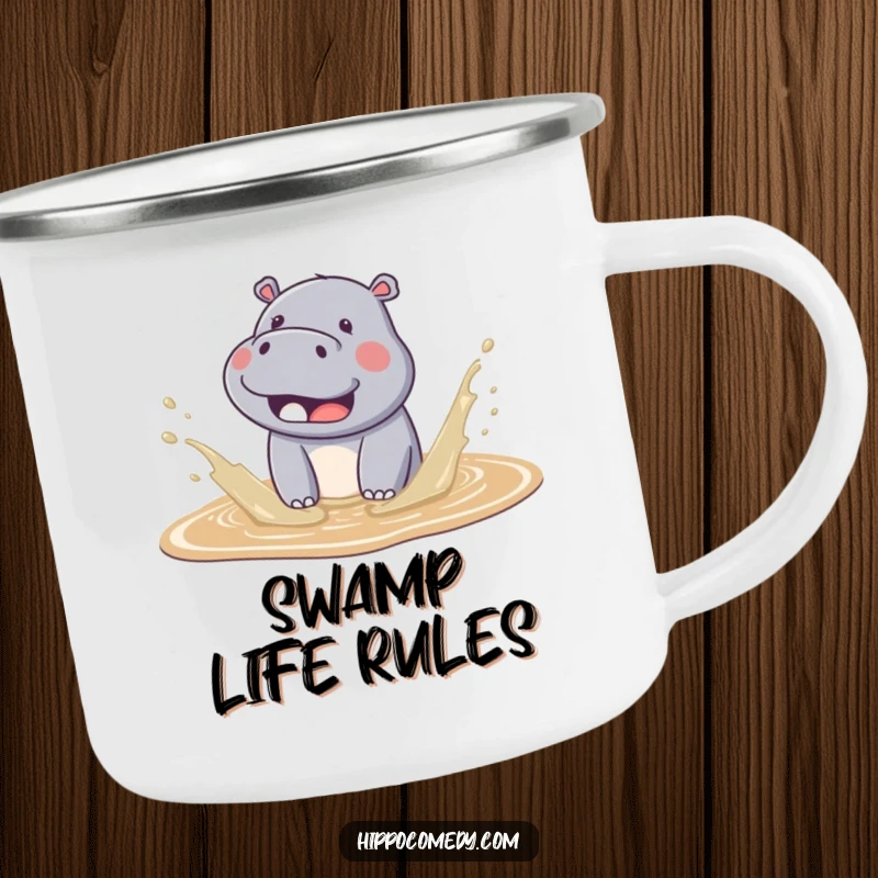 Funny kawaii hippo camping mug showing a cute hippo joyfully splashing in mud, ready for outdoor fun.