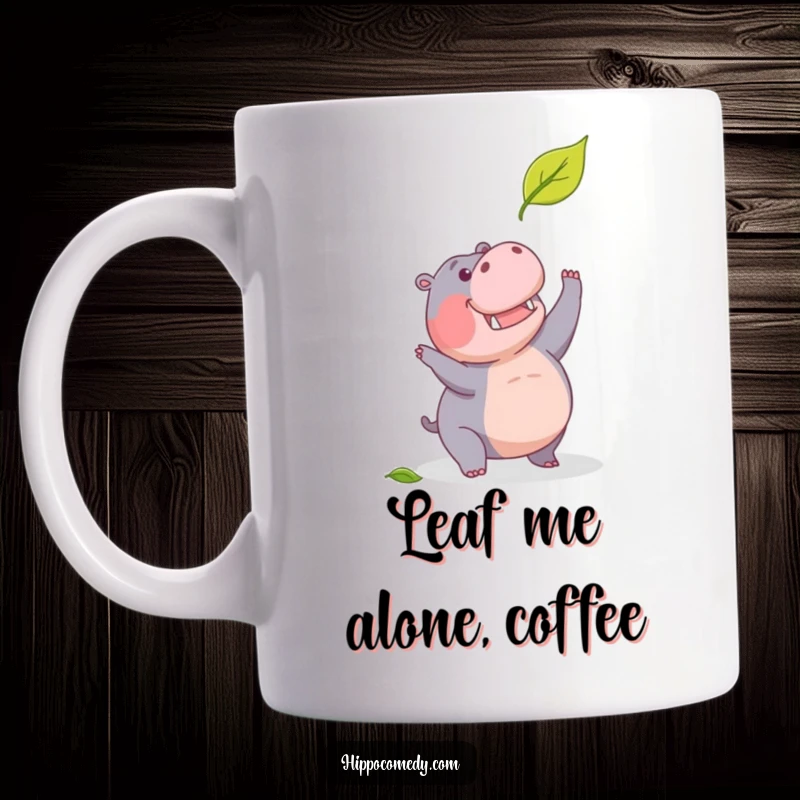Funny mug showing a determined hippopotamus leaping to catch a falling leaf, embodying humorous effort.