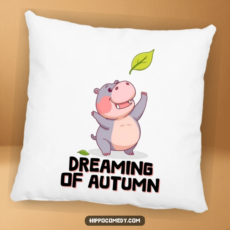 Funny pillow showcasing a determined hippopotamus humorously reaching for a falling leaf, adding comfort and motivation.