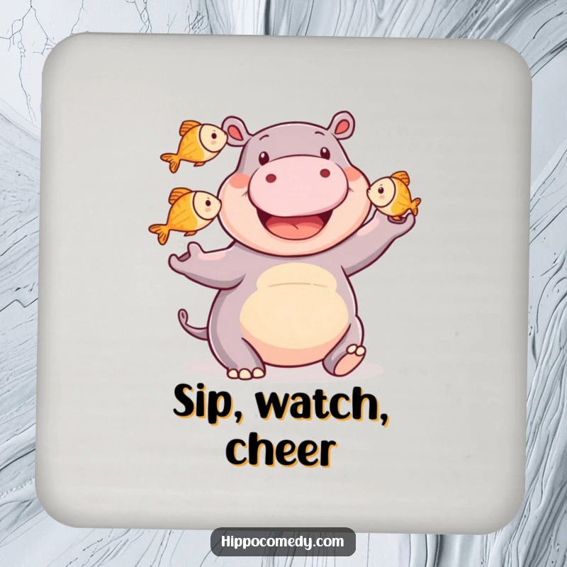 Funny happy hippo coaster showcasing a smiling hippopotamus juggling three small fish, ready to protect surfaces with aquatic charm.
