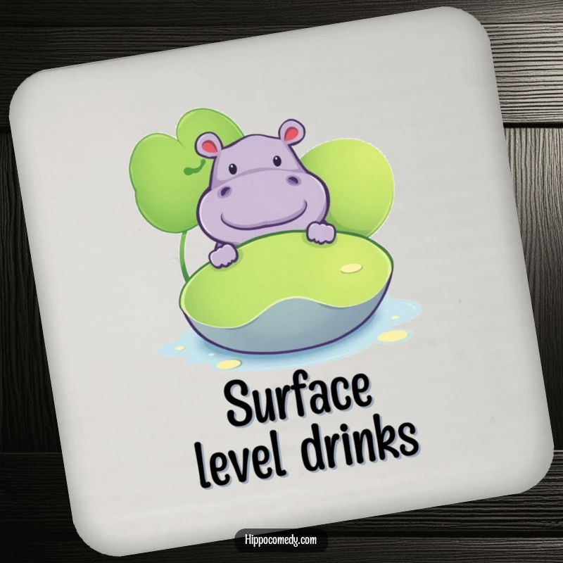 Funny drink coaster with a hippopotamus peeking from behind a lily pad, perfect for protecting surfaces humorously.