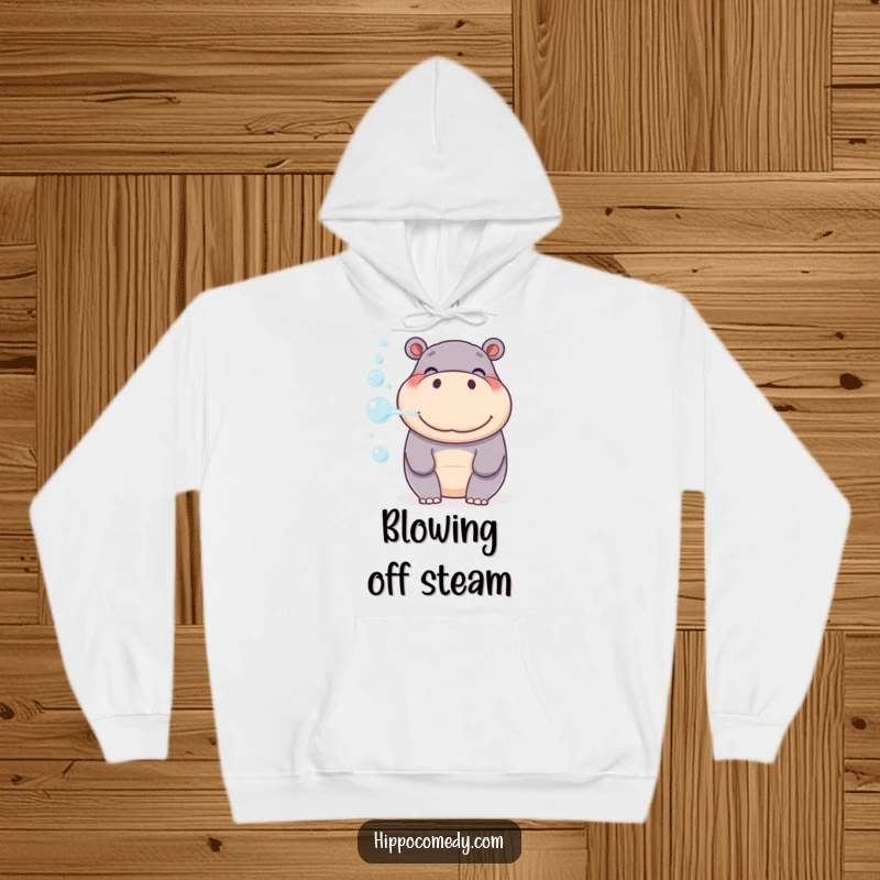 Funny Hippo Hoodie, a smiling hippo gently blowing a stream of colorful bubbles, perfect for cozy wear.