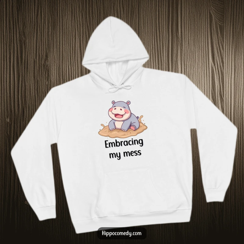 Funny Hippo Mud Hoodie, a joyful hippo playfully rolling in soft brown mud, embodying pure fun.