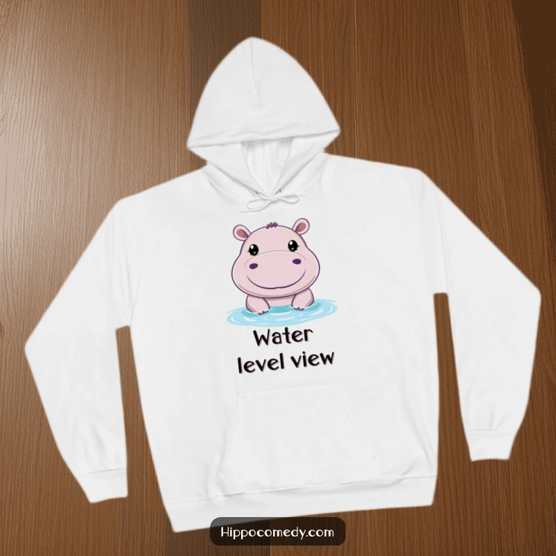 Funny cozy hoodie featuring a cheerful hippo with big, round eyes, peeking above water for warm, humorous vibes.