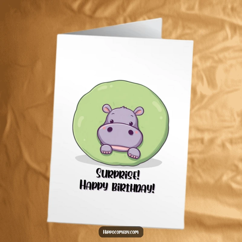 Funny Free Printable Birthday Card: A curious hippo peeks out from behind a large, round lily pad.