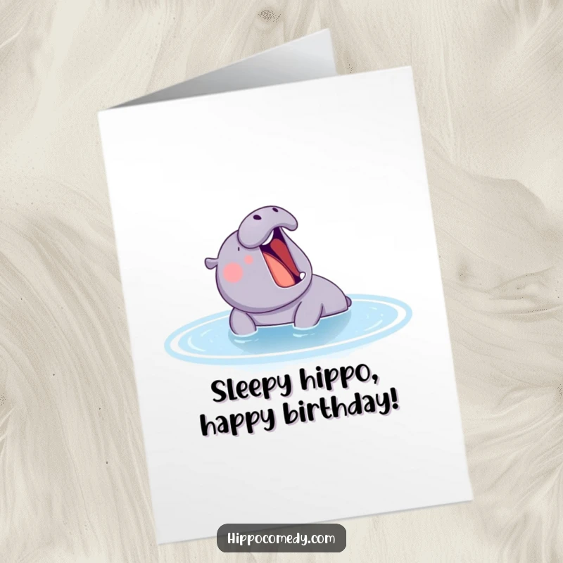 Funny Free Printable Birthday Card: A huge yawning hippo relaxes in a blue pond, spreading birthday cheer and slobbery smiles.