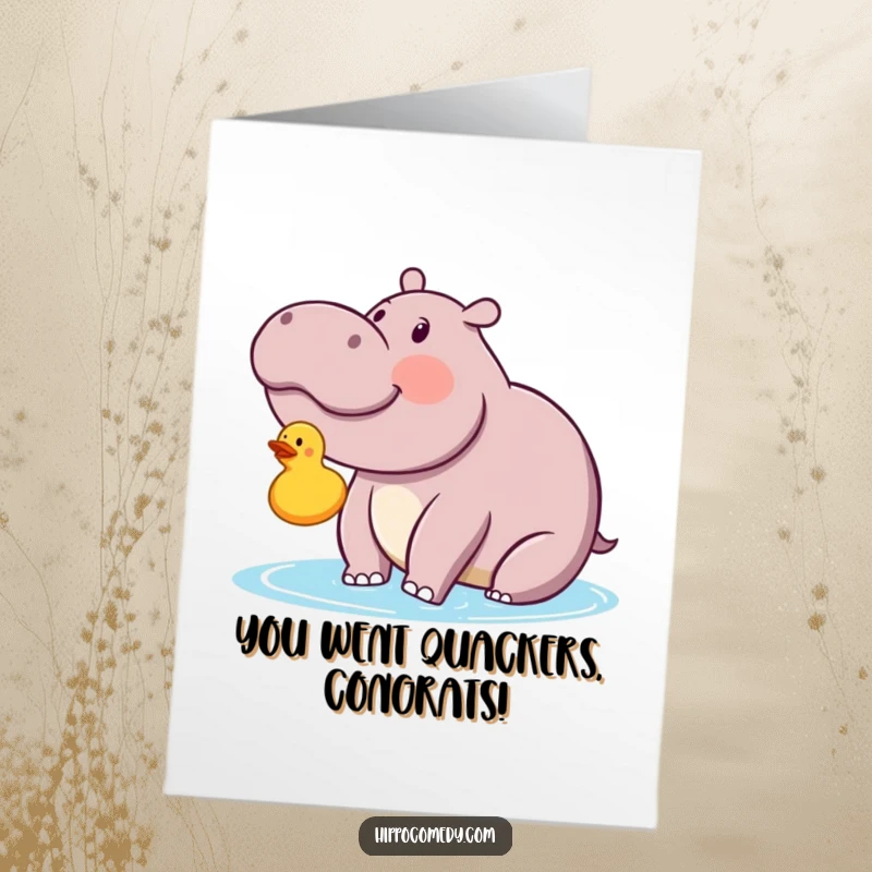 Funny Free Printable Congratulations Card: A kawaii hippo gazing with delightful fascination at a small floating rubber ducky.
