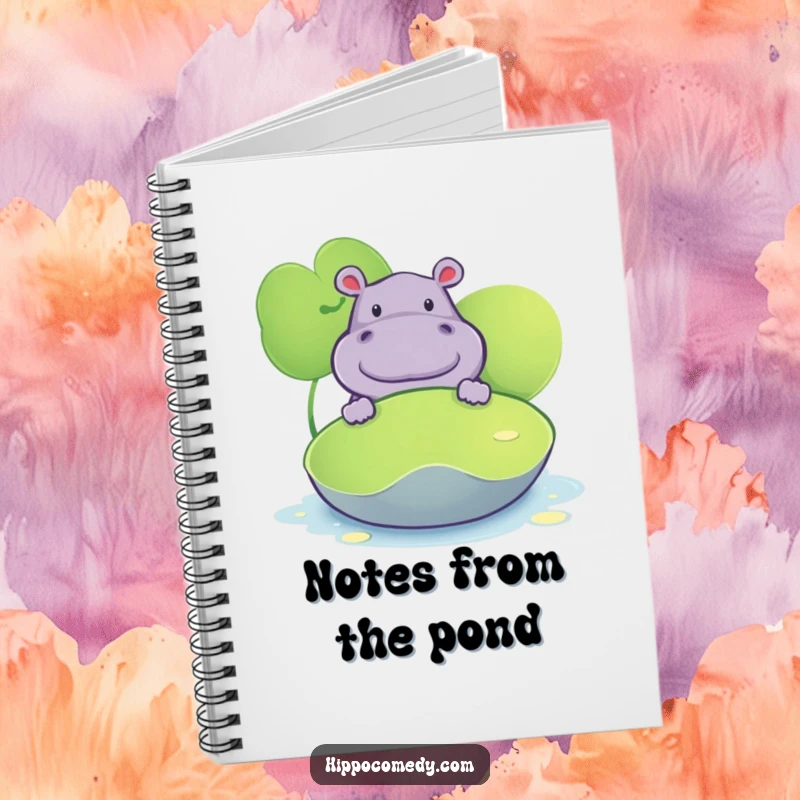 Funny notebook featuring a hippopotamus peeking from behind a lily pad, great for journaling and creative writing.