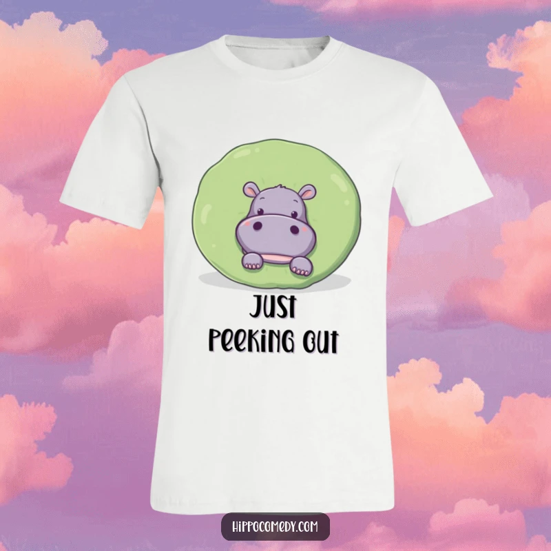 Funny T-Shirt: A curious hippopotamus is playfully peeking from behind a huge, round green lily pad.