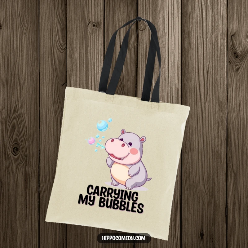Funny Tote Bag: A playful hippopotamus blows a trail of colorful rainbow bubbles, spreading cheer.