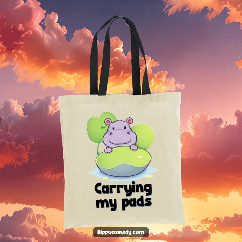 Funny tote bag showing a hippopotamus peeking from behind a large lily pad, ideal for everyday use with a twist.