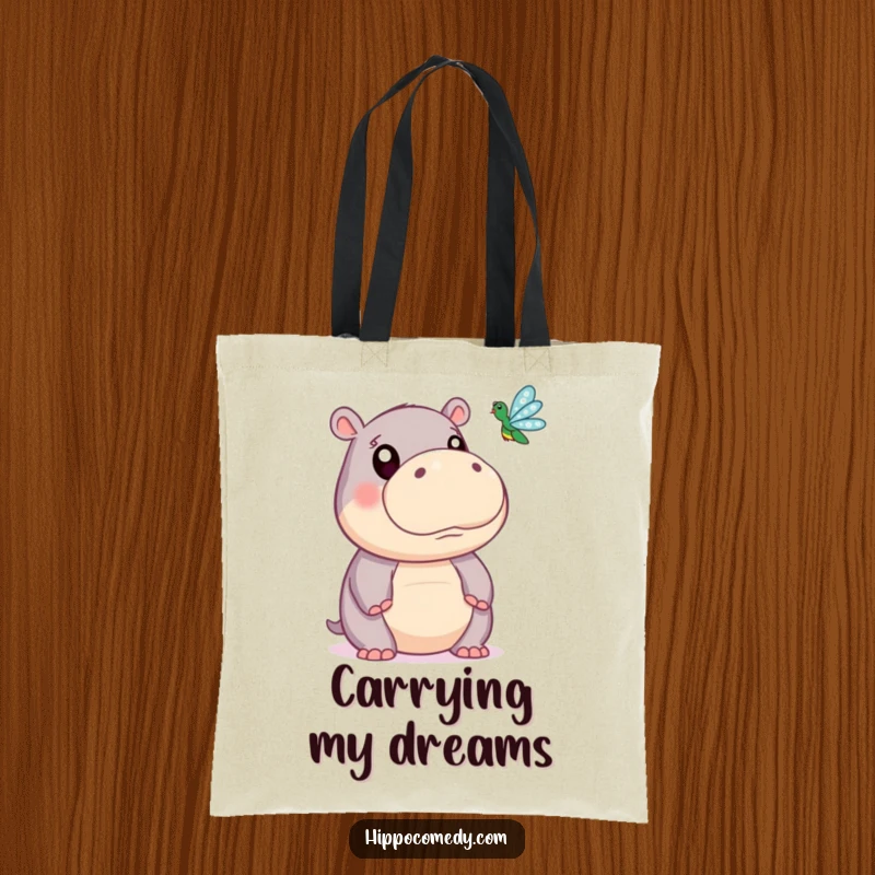 Funny tote bag depicting a cute hippopotamus with wide, curious eyes watching a tiny dragonfly in flight, ideal for everyday use.